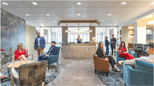 People sitting in the common space in a Quest Workspace location